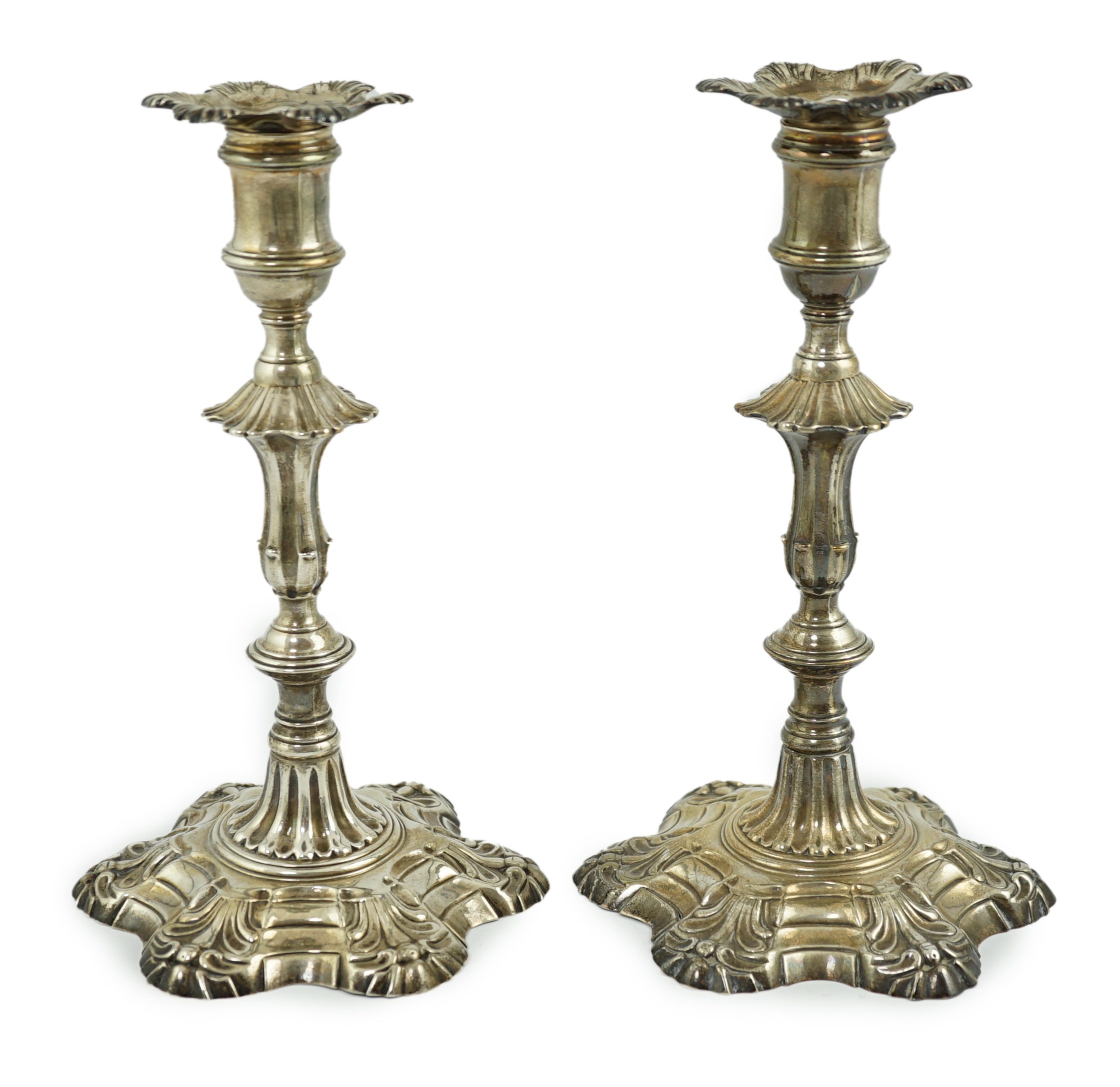 A pair of early George III cast silver candlesticks, by William Cafe